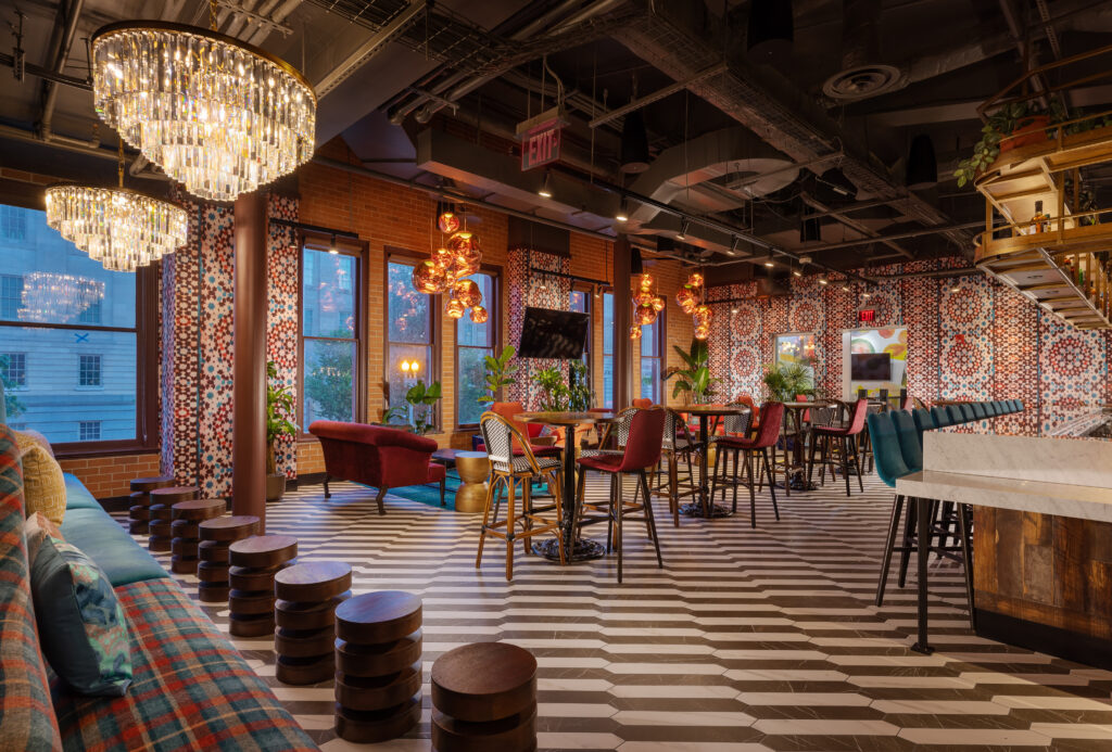 Puttery Washington DC indoor mini golf and cocktail bar with stylish lounge seating and immersive course design.