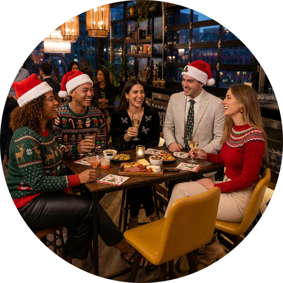 Friends in holiday sweaters toast over cocktails and shareable food at a Puttery holiday party