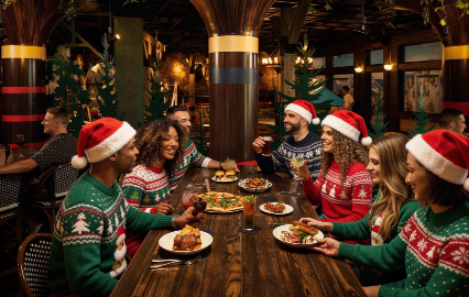 Holiday party group enjoys food and drinks in a reserved Puttery event space