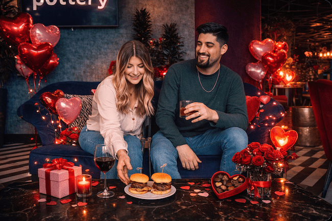 Couple on sofa with Valentine's decor