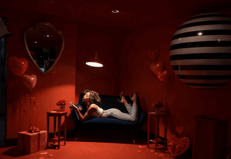 Girl in Illusion Room Entryway with Valentine's Decor